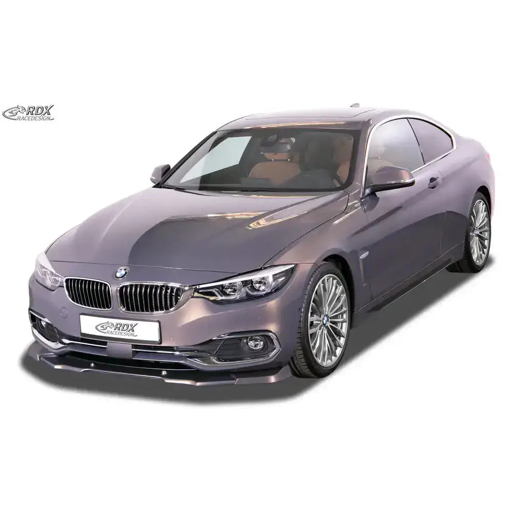 Frontspoiler på BMW 4 F32 med sportslig design, store aluminiumsfelger og metallic grå lakk.