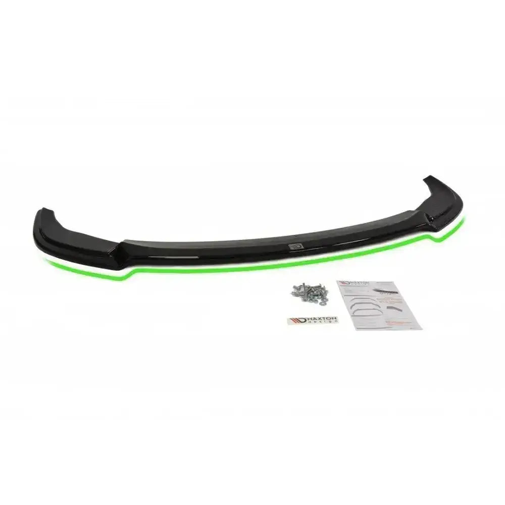 Frontspoiler BMW 5 E60/61 M-Pack i sort blank plast med grønn kant, sett ovenfra med skruer og instruksjoner.