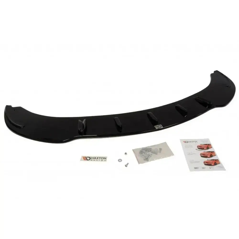 Front lip til BMW 6 E63/E64 V.1 sett ovenfra med vertikale finner, monteringsutstyr og instruksjoner.