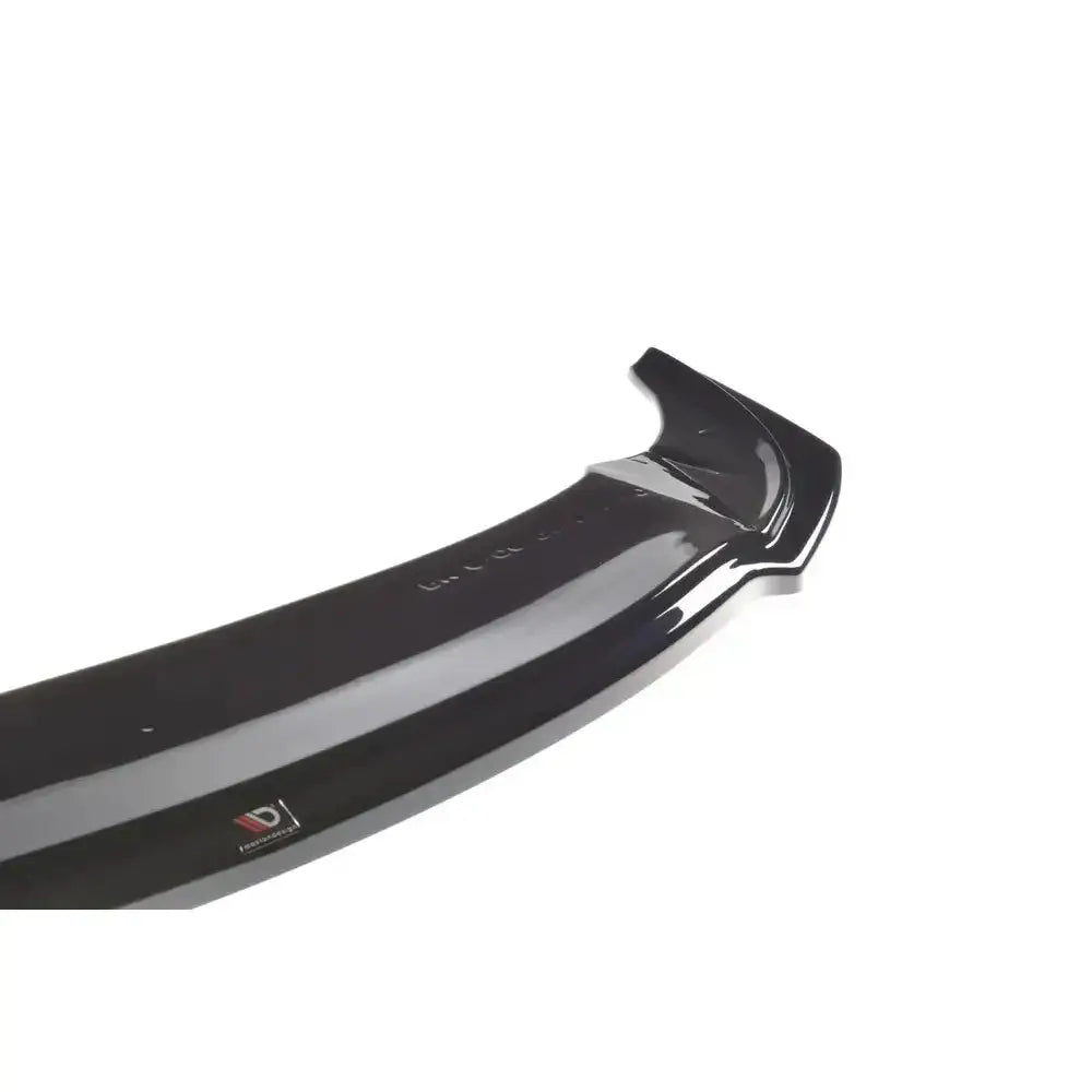 Frontspoiler til BMW 6 Gran Coupé i sort, glanset finish med synlig logo fra skrå vinkel.