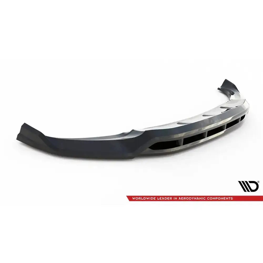 Front splitter til BMW X3 G01, sort plast med markerte linjer og luftåpninger, skrått forfra mot hvit bakgrunn.