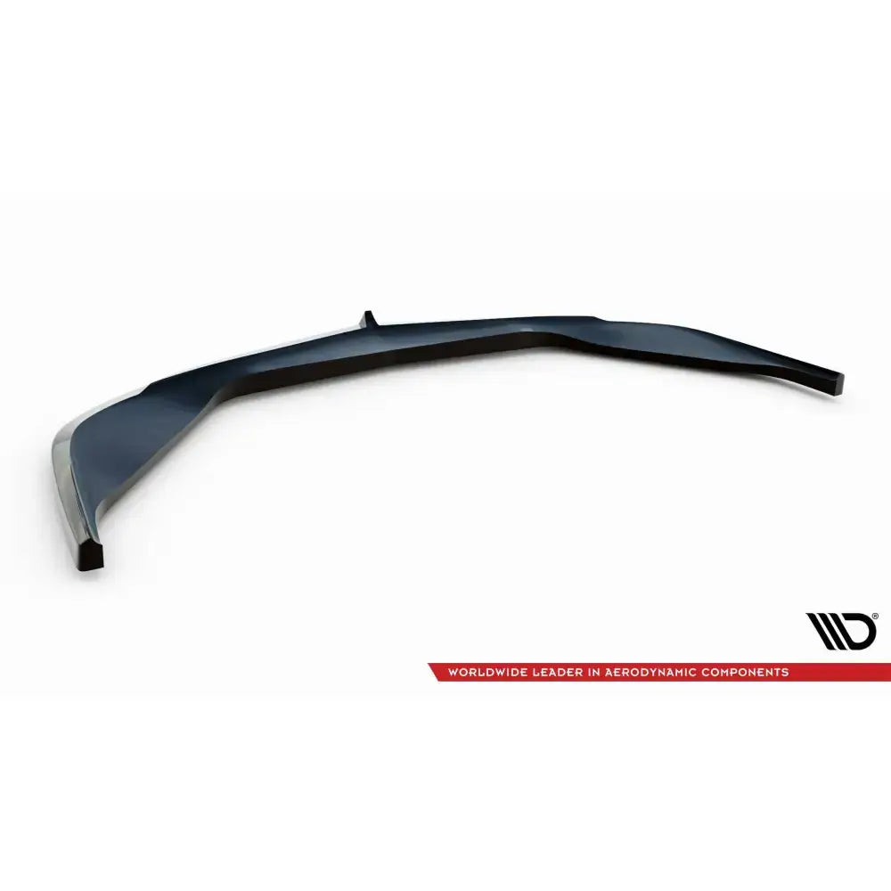 Front splitter til Chevrolet Corvette C5, sort plast med bølget design og markerte kanter, sett skrått ovenfra.