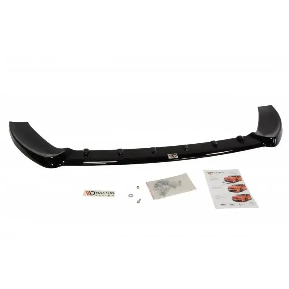 Front splitter til Ford Fiesta Mk7 St Facelift, sett ovenfra med monteringsutstyr og instruksjonshefte.