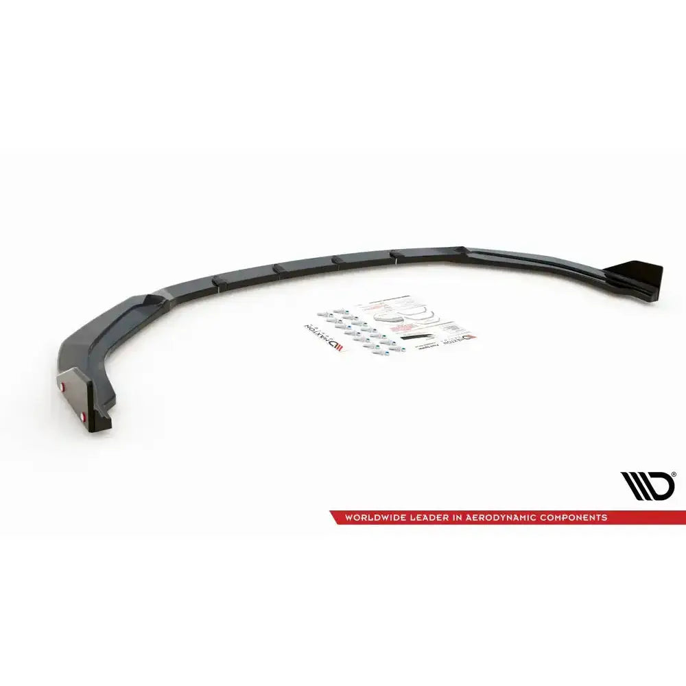 Front splitter til Toyota Corolla GR Sport Hatchback, sort med røde detaljer og monteringsutstyr på hvit bakgrunn.