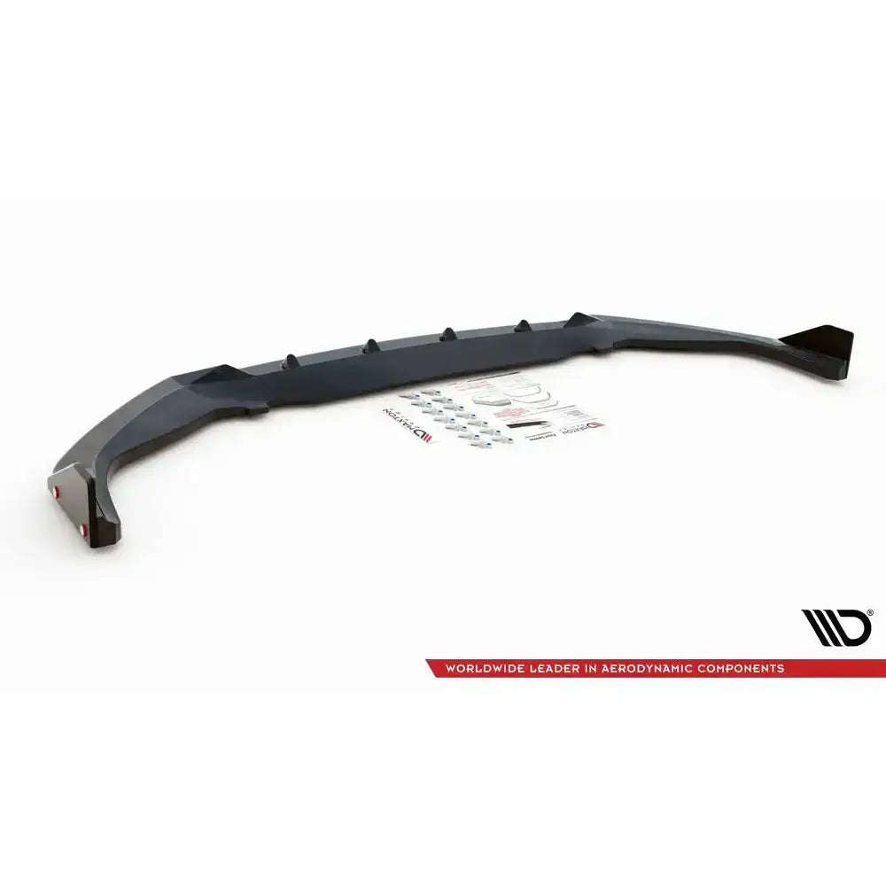 Frontspoiler til Toyota GR Yaris Mk4 V.2 med flaps, sort plast sett fra skrå vinkel med tilbehør.