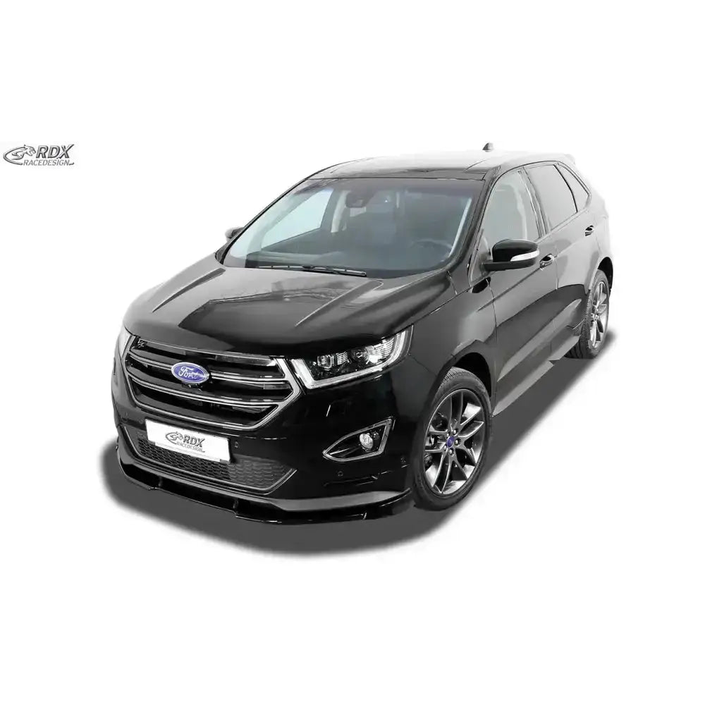 Frontspoiler på svart Ford Edge 2 ST-Line med kromdetaljer og LED-lykter sett forfra mot hvit bakgrunn.