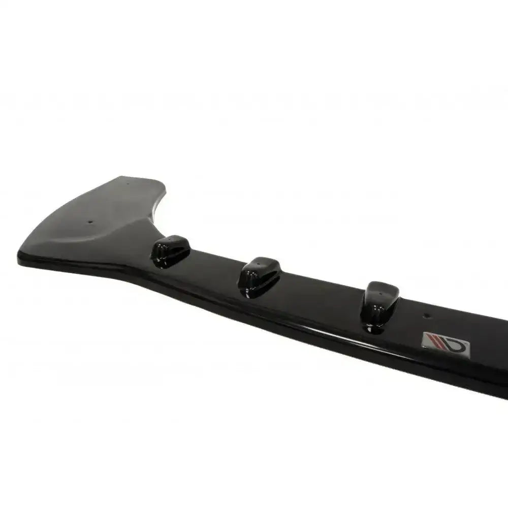 Front splitter til Ford Fiesta Mk7 ST Facelift, sort og blank med tre fester og liten logo.