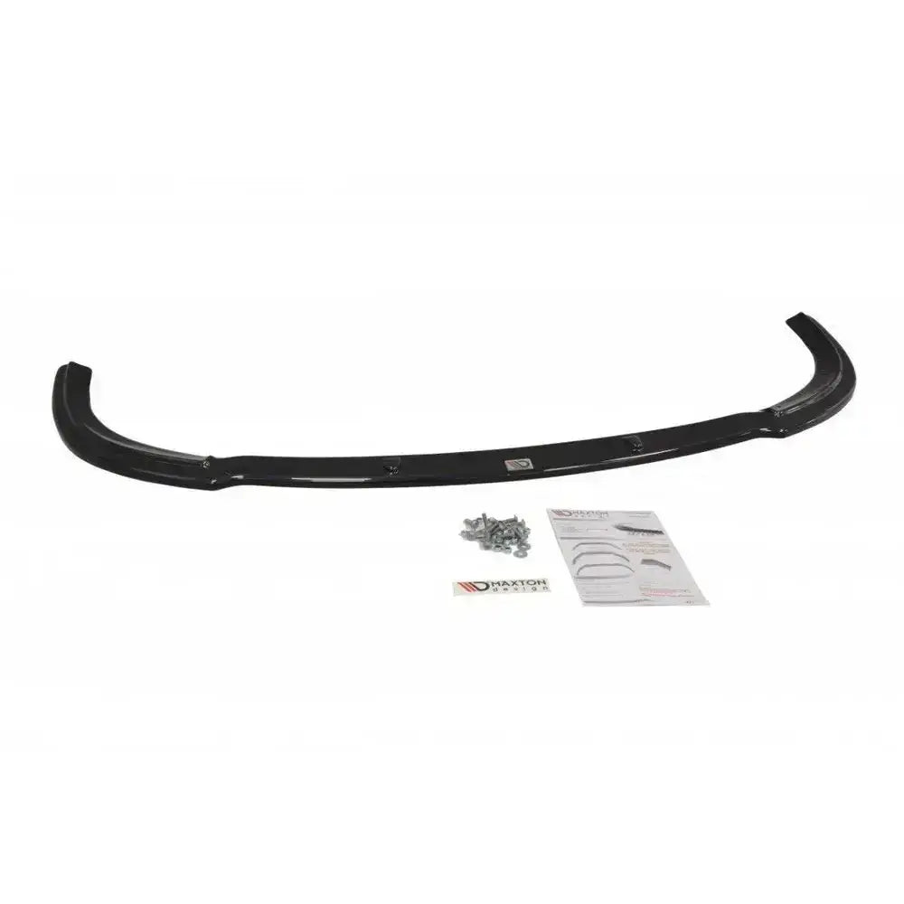 Front splitter til Ford Mondeo Mk3 St220 i sort glanset plast med skruer, instruksjon og logo sett ovenfra.