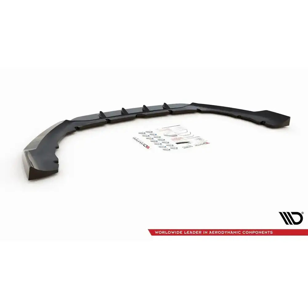 Frontspoiler til Ford S-Max Mk2 Facelift med svarte vinger, monteringsutstyr og klistremerker foran delen.