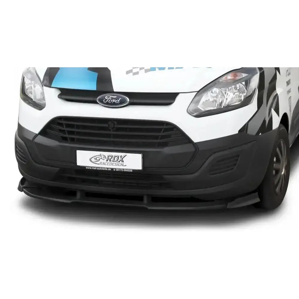 Frontleppe på Ford Transit Custom med svart plastspoiler, RDX-logo og sportsdekor på panseret.