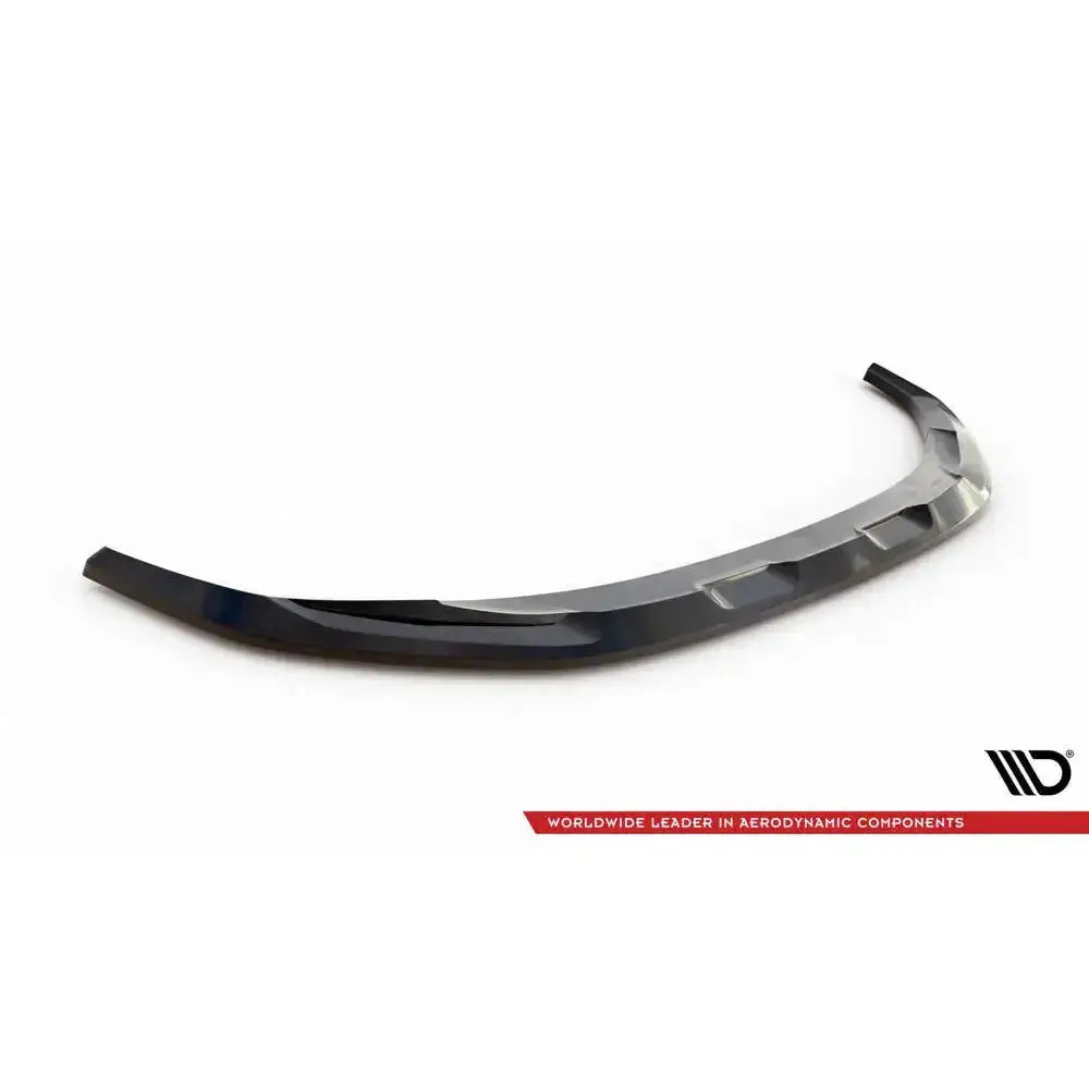 Front splitter til Hyundai Tucson Mk4 V.1, svart blank spoiler med firkantede detaljer, sett skrått ovenfra.