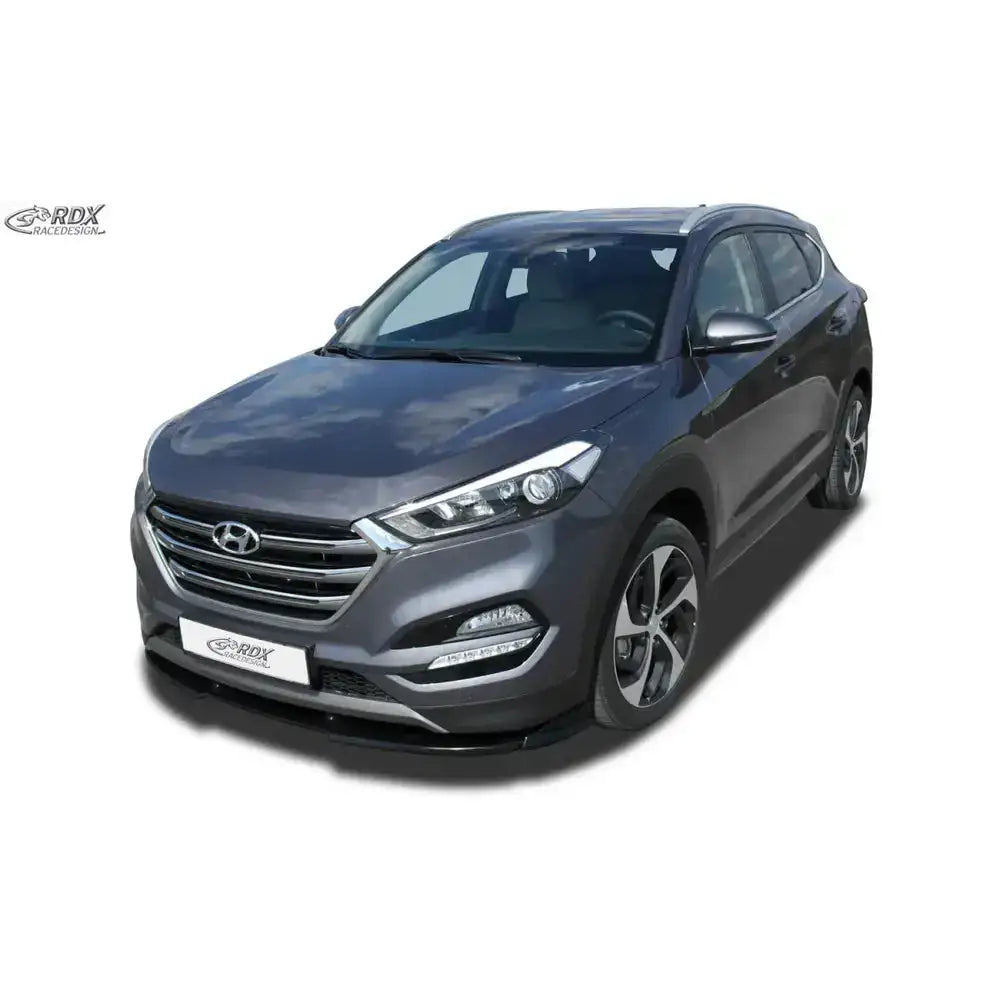 Frontsplitter på Hyundai Tucson TL 2015-2018, mørk grå SUV med kromgrill og store tofargede felger.