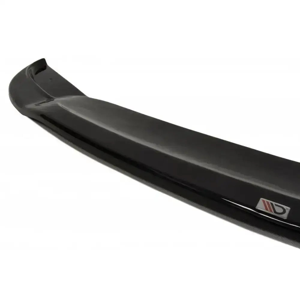 Frontsplitter til Jeep Grand Cherokee WK2 Summit Facelift, sort og blank med metallogo, sett fra skrå vinkel.