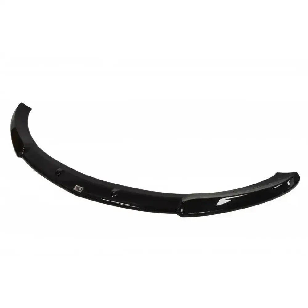 Frontspoiler til Mazda Cx-7 i svart blank plast, sett ovenfra med synlige festepunkter på hvit bakgrunn.