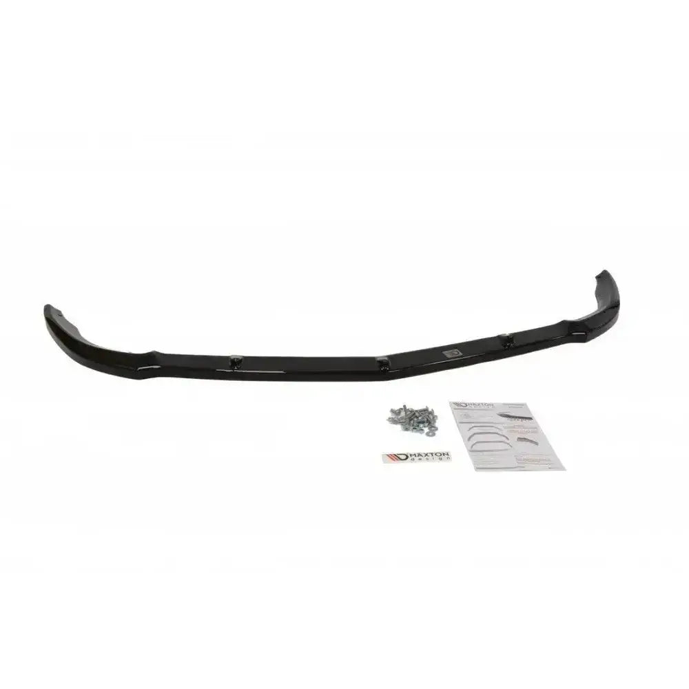 Front lip Mercedes Cls C219 sort frontsplitter sett ovenfra med skruer, instruksjon og logoetikett.