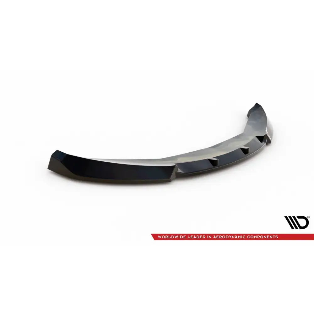 Frontsplitter til Mini Cooper Countryman R60 Facelift i sort plast med vinkler og luftkanaler, sett skrått ovenfra.
