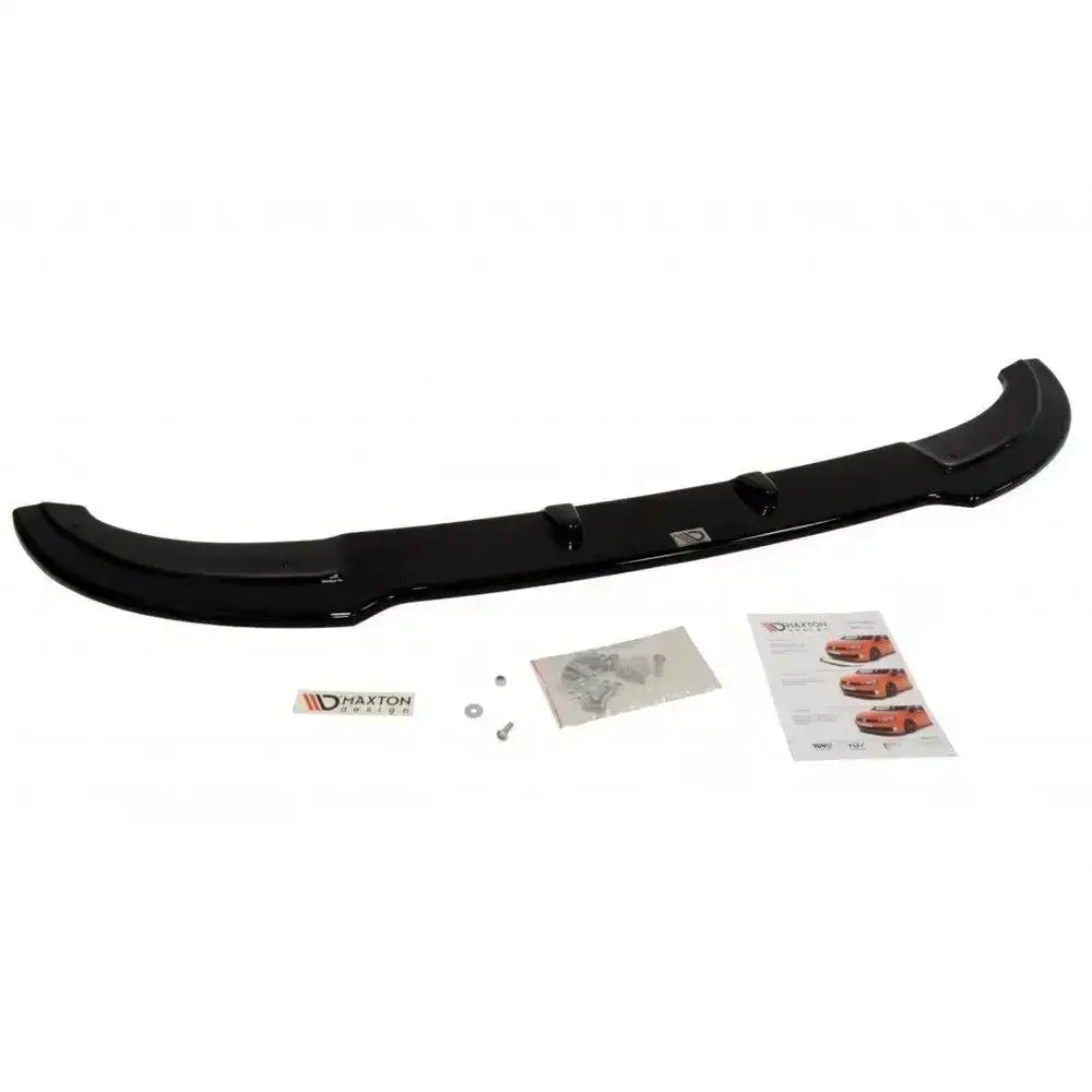 Front lip Mini Cooper R56 Jcw sort plast med monteringsdeler, instruksjonsark og logoetikett.
