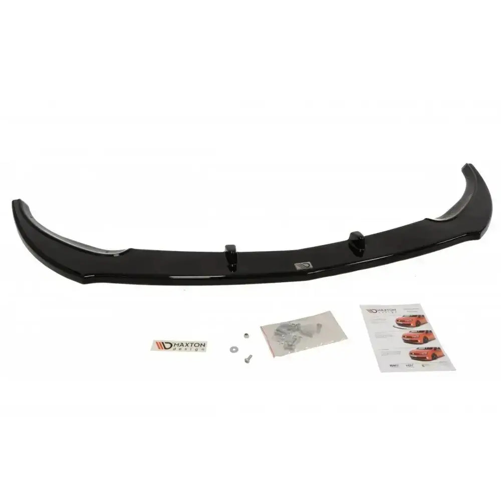 Frontsplitter Opel Astra J Gtc sett ovenfra med monteringsskruer, instruksjoner og klistremerke.