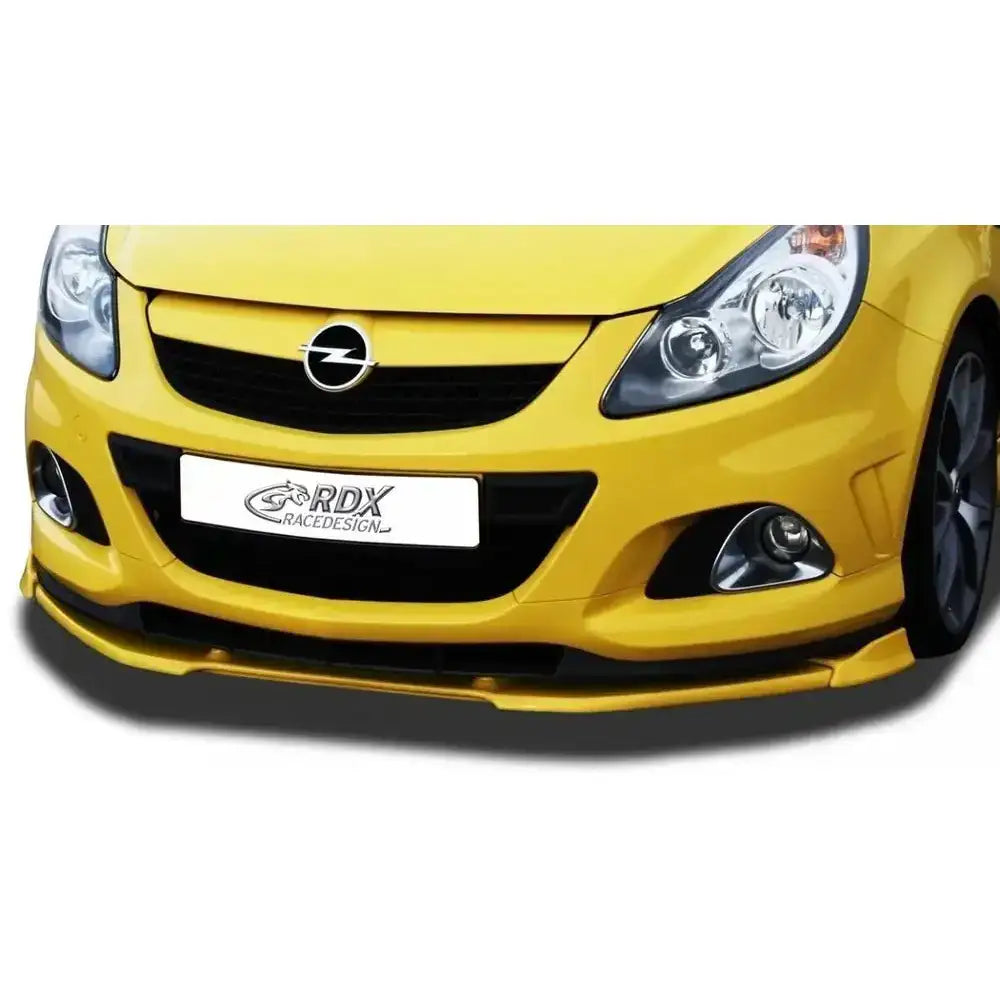 Frontleppe Opel Corsa D 06-10 OPC Nuerburgring Edition med sort grill og spoiler på gul bil.