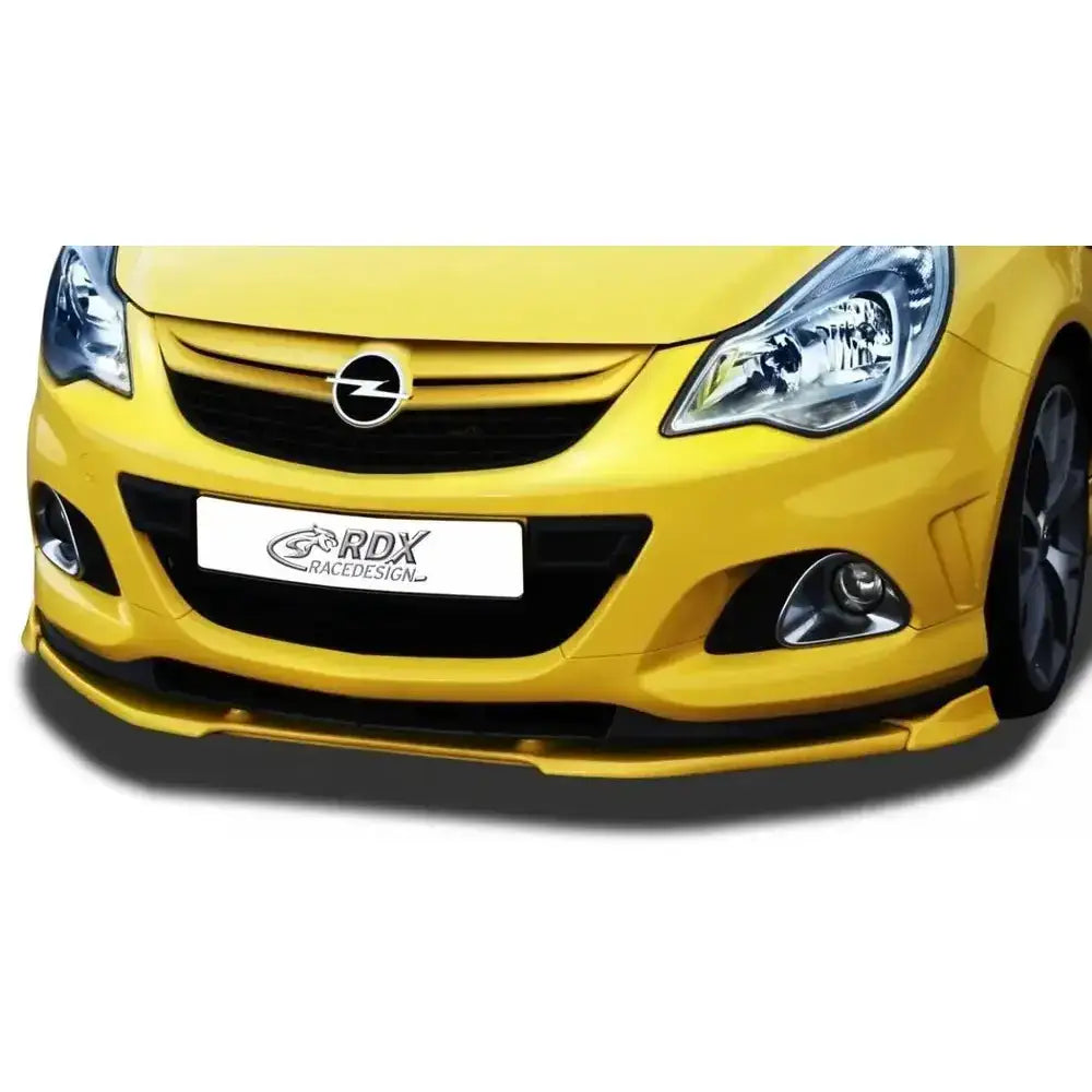 Frontleppe Opel Corsa D Vario X i sort og gult under støtfangeren på gul bil, sportslig design.