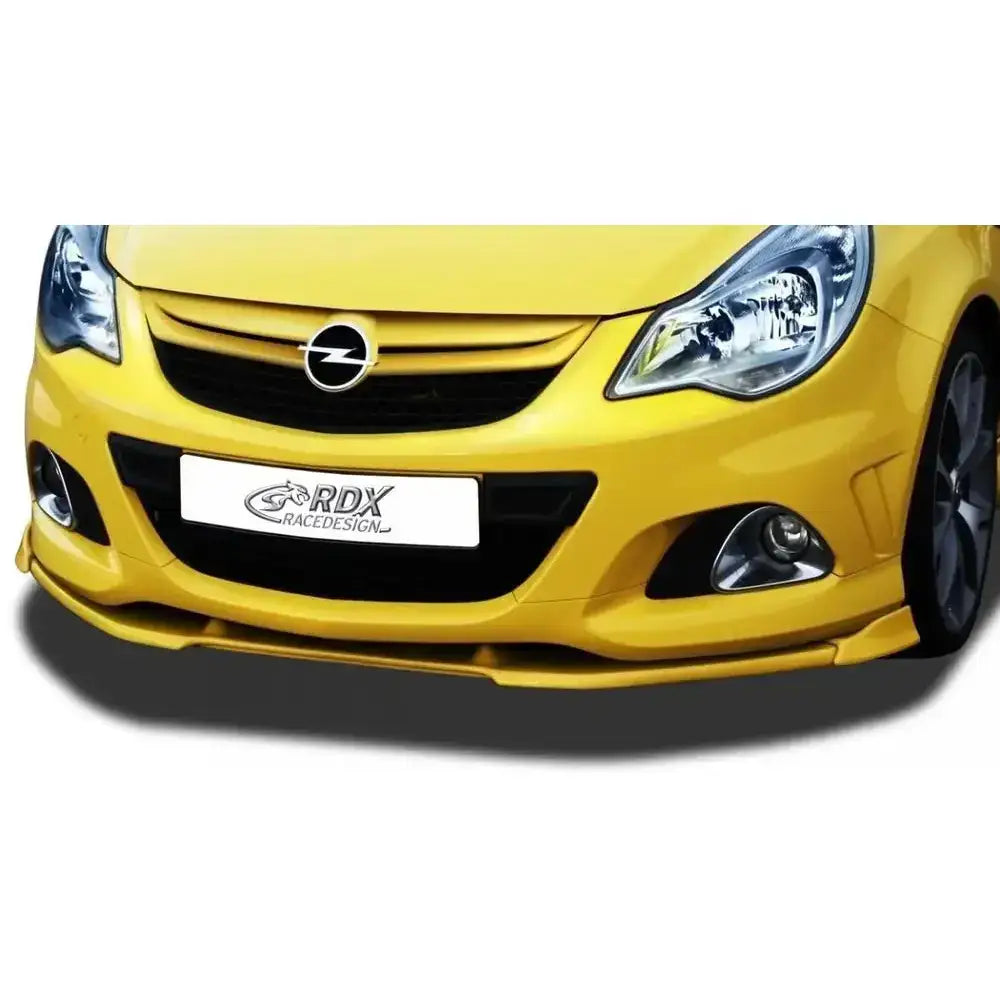 Frontleppe Opel Corsa D 10-14 Facelift med sort grill, tåkelys og fremhevet spoiler, sett forfra.