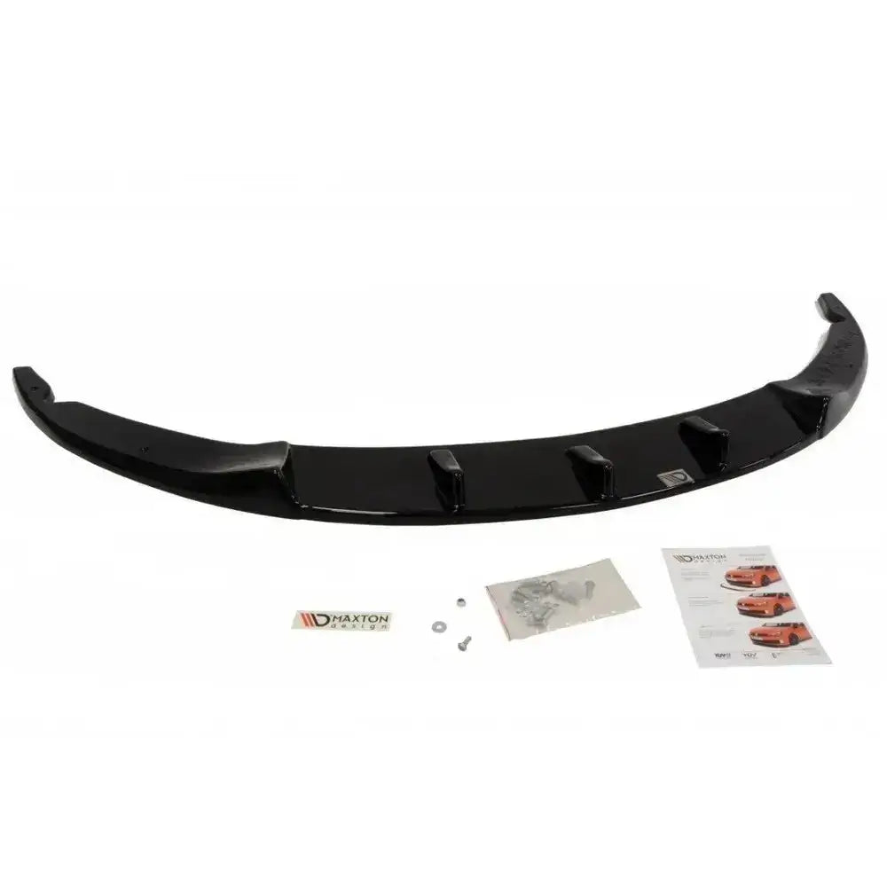 Front splitter til Opel Corsa D Nurburg med monteringsutstyr, klistremerke og instruksjonsark.