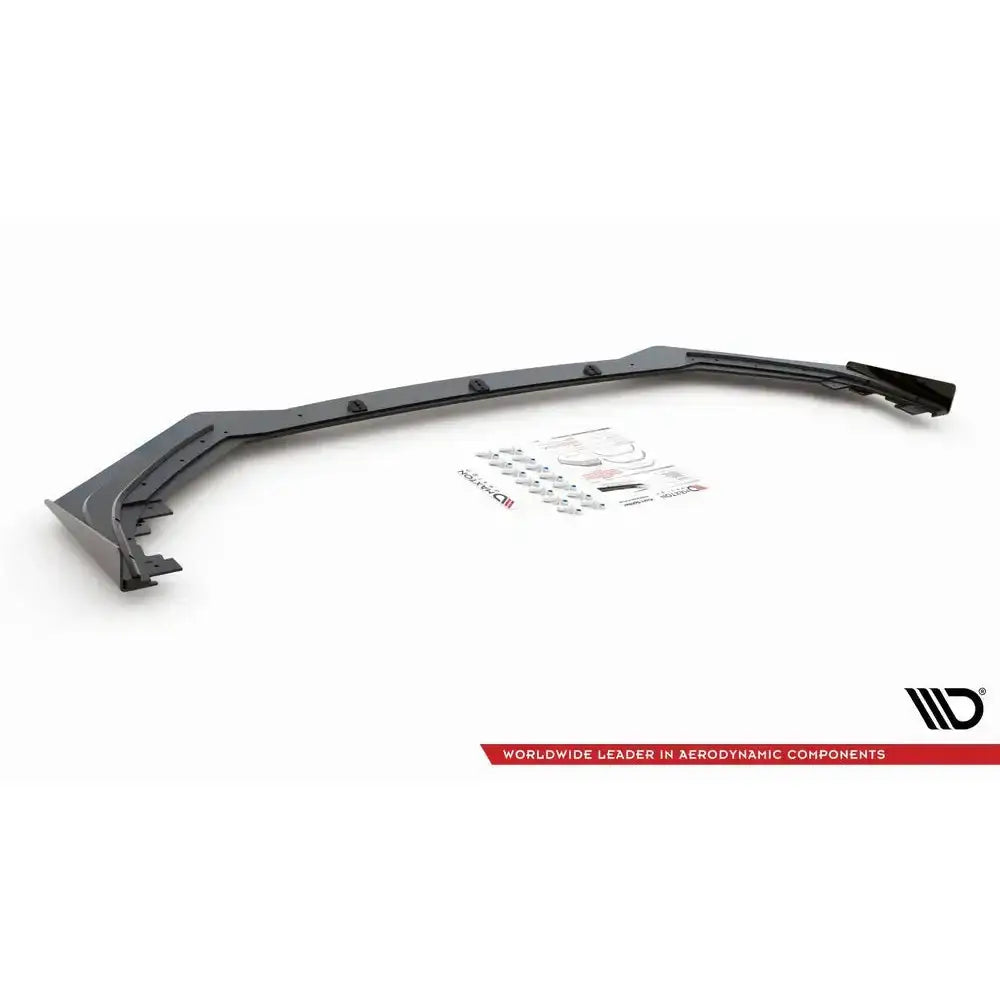 Frontspoiler Racing Durability med flaps og monteringsutstyr til Toyota GR Yaris MK4 på hvit bakgrunn.