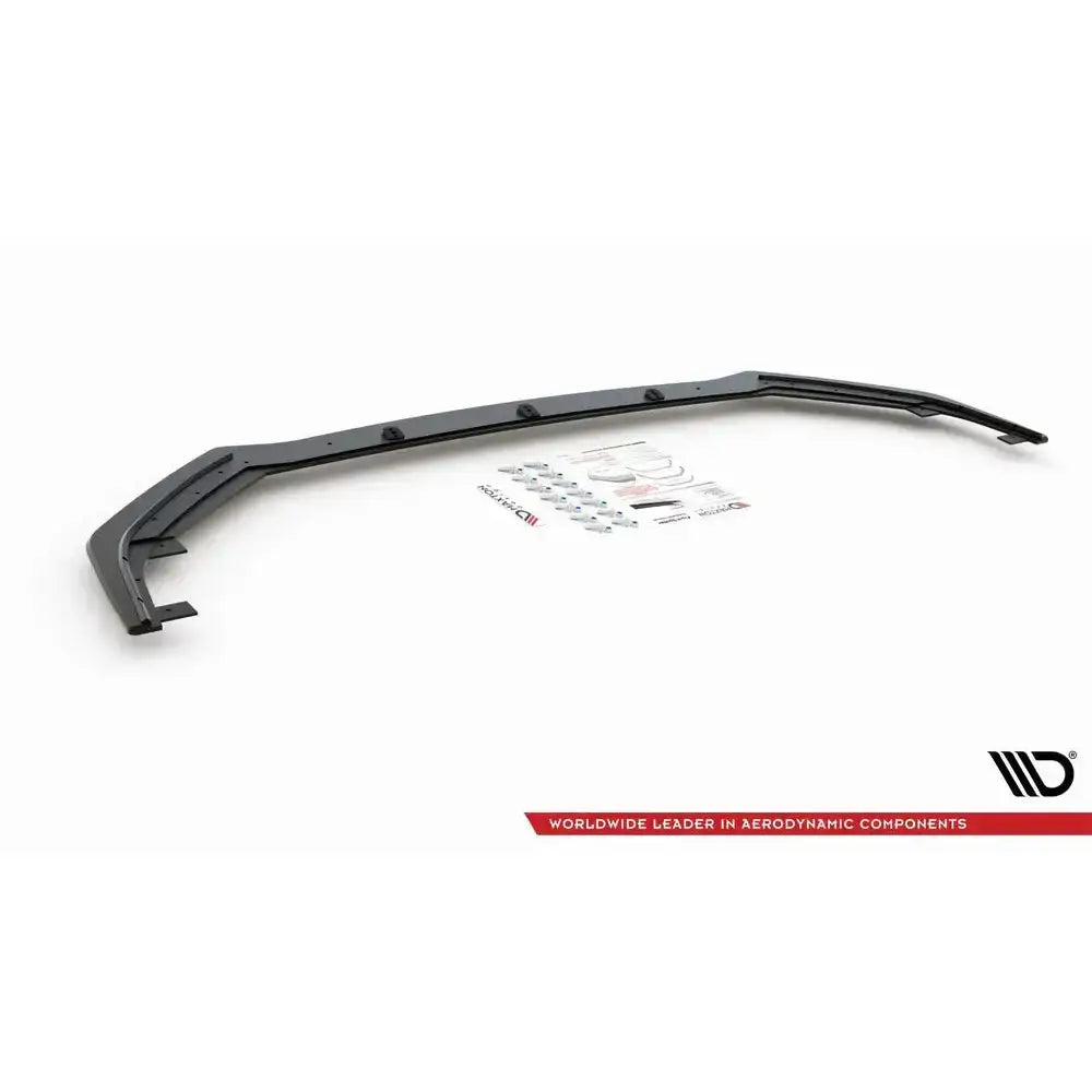 Frontspoiler Racing Durability til Toyota GR Yaris MK4 med monteringsutstyr og instruksjoner på hvit bakgrunn.