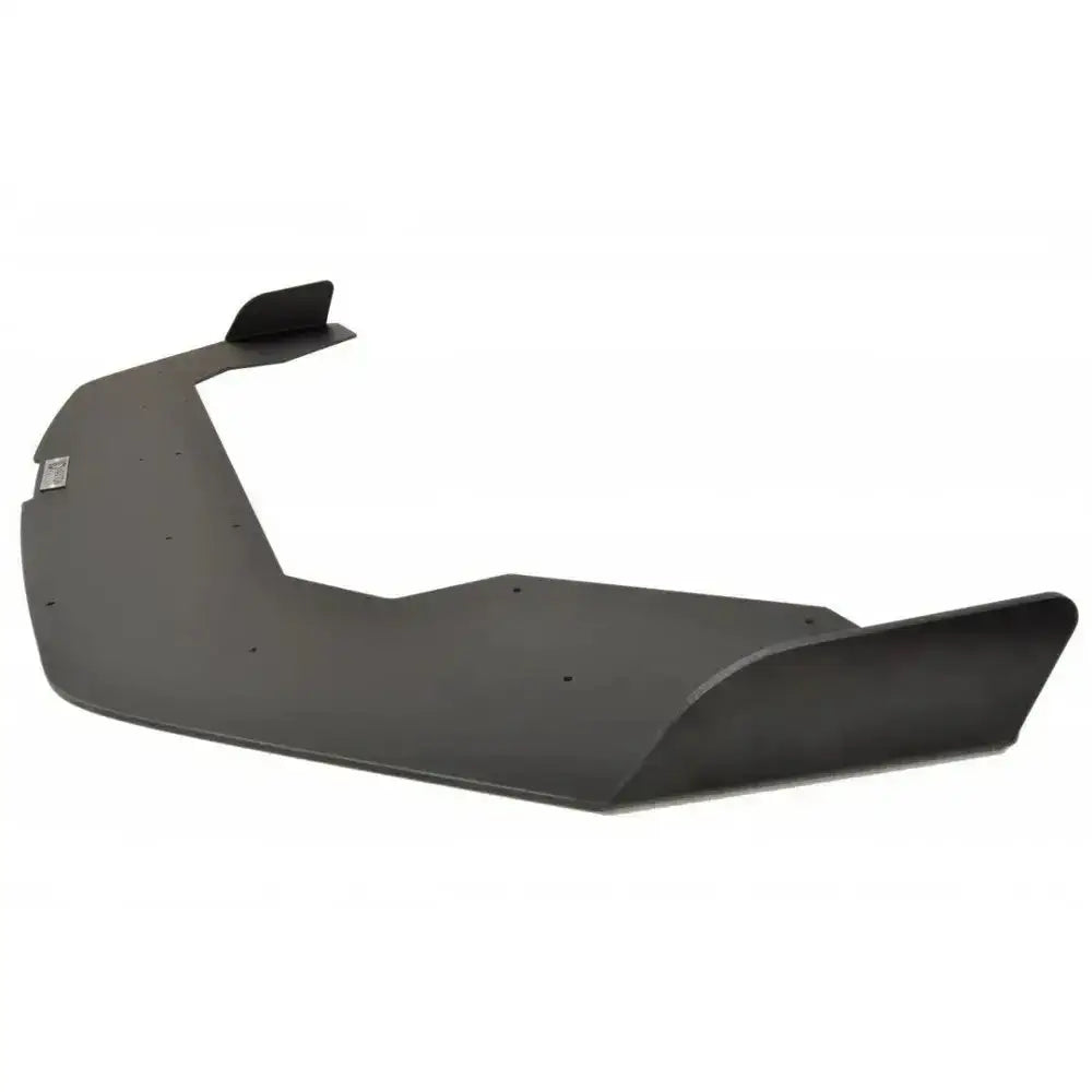 Front lip for Ford Fiesta Mk7 ST Facelift med vinger, svart plast, sett skrått bakfra med forhøyede kanter.