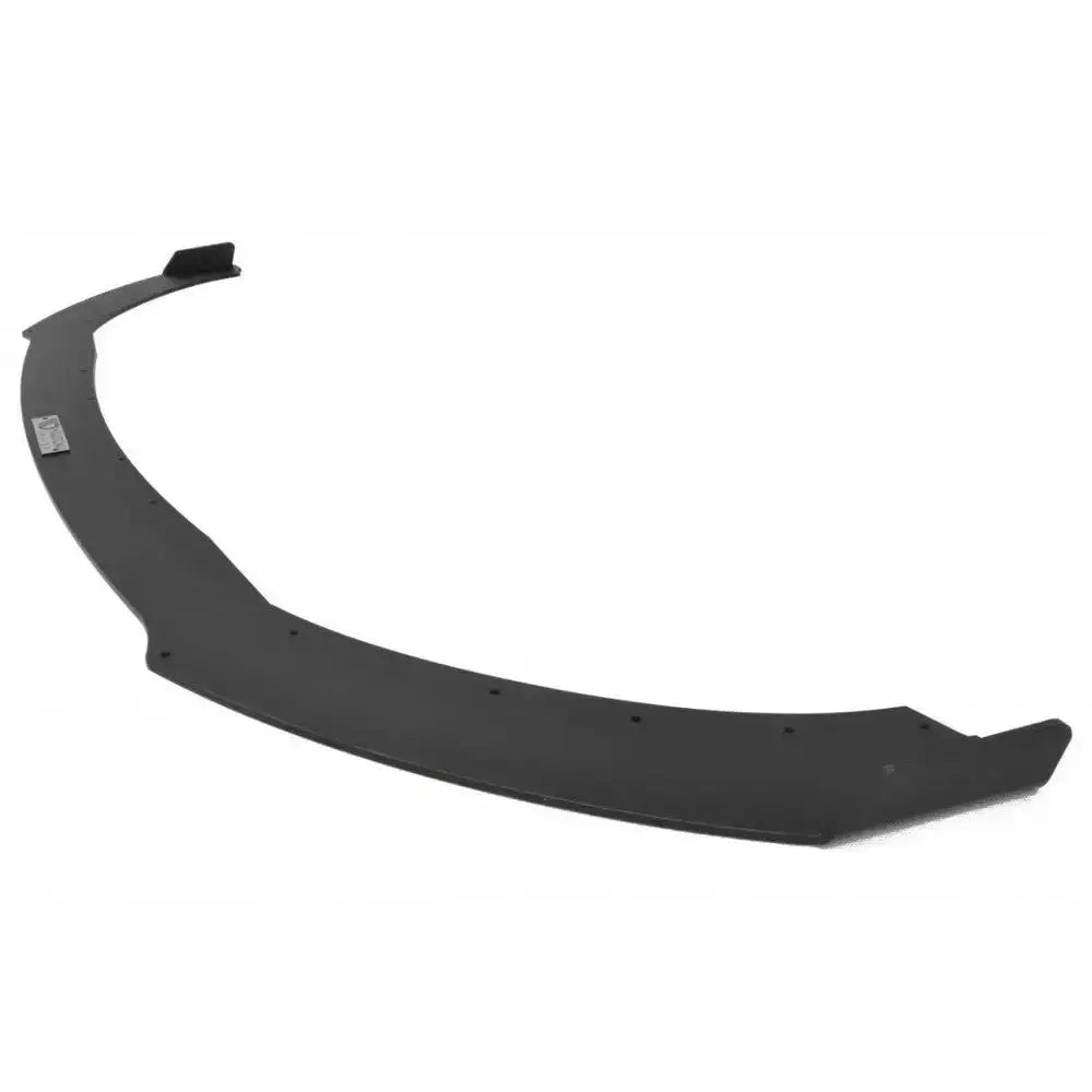 Frontsplitter til Mazda Mx-5 Mk4 i svart plast med skruehull og metallplate, sett fra skrå vinkel.