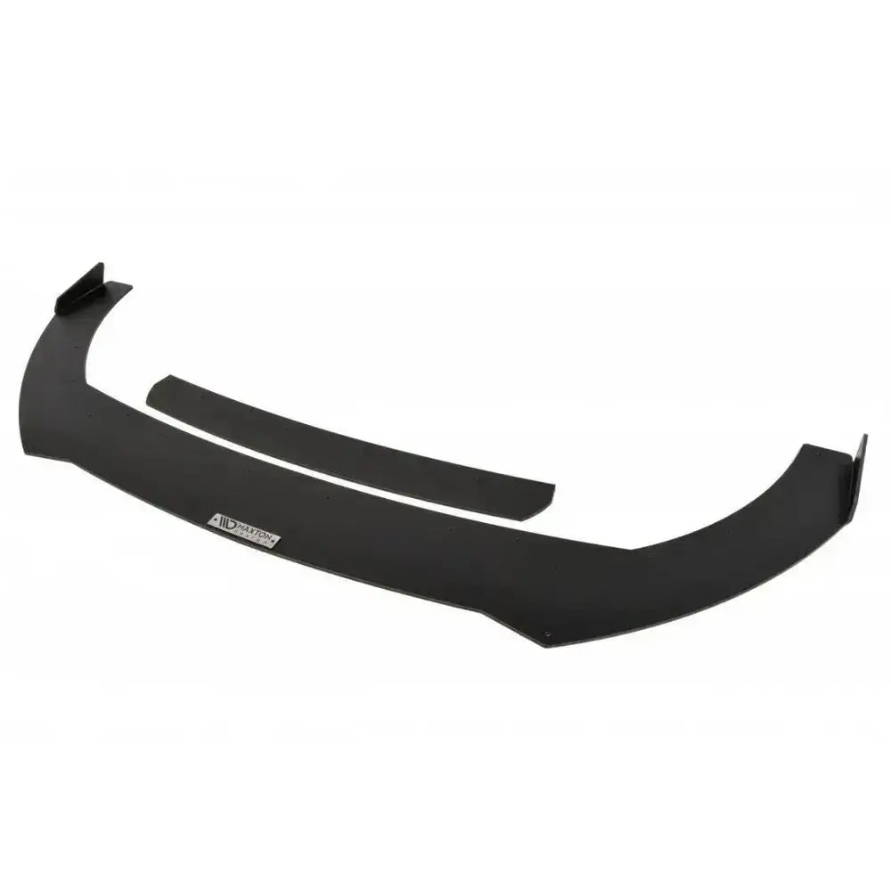 Frontspoiler Racing V.2 til Ford Focus 3 St, svart plast, sett skrått ovenfra med ekstra del og logo.