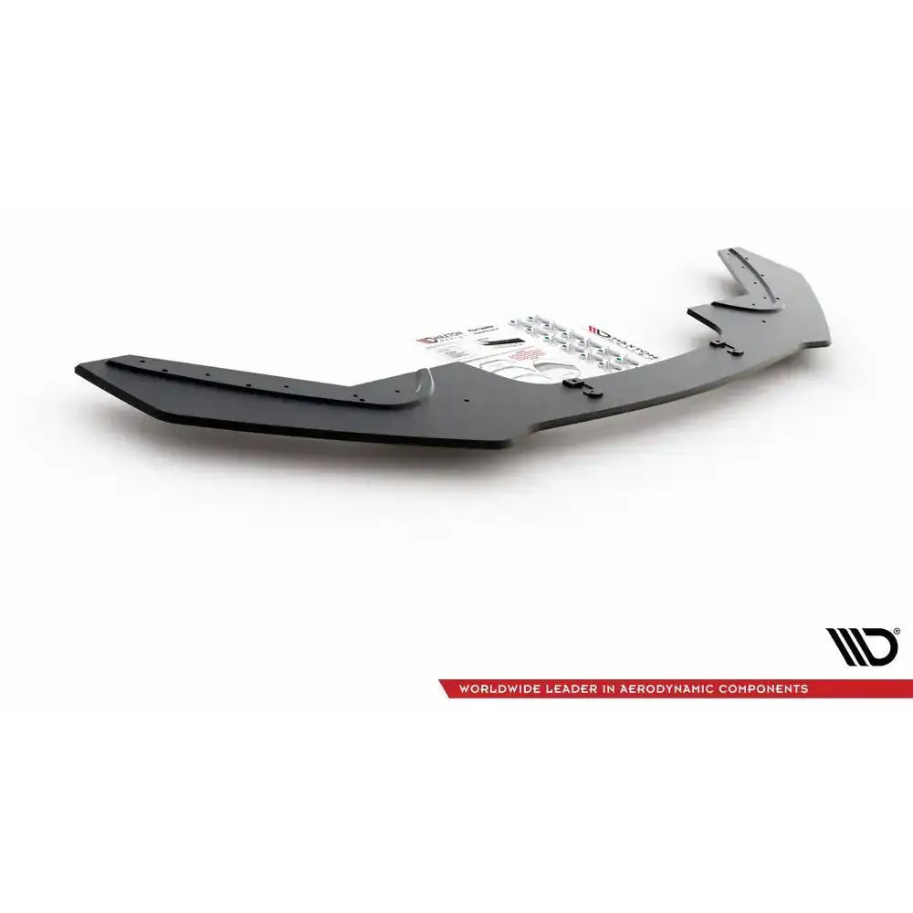 Frontleppe Racing V.3 til BMW 1 F20 M-Pack, sett fra skrå vinkel med monteringsdeler og instruksjoner.