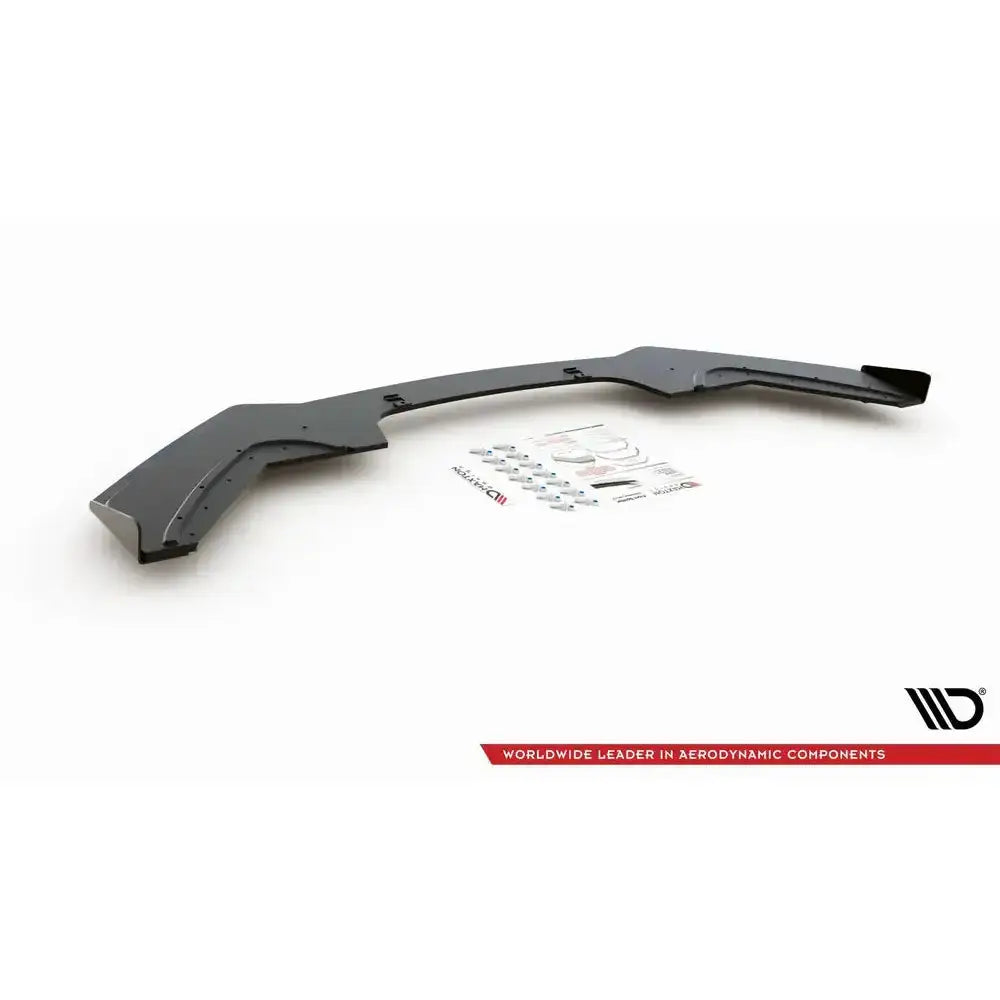 Frontspoiler Racing V.3 med flaps til BMW 1 F20, sett skrått ovenfra med monteringsdeler og instruksjoner.
