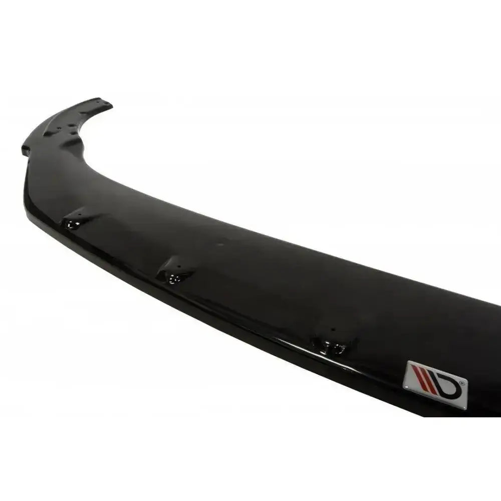 Frontsplitter til Skoda Fabia II Facelift, sort blank plast med synlige festepunkter og logoetikett.