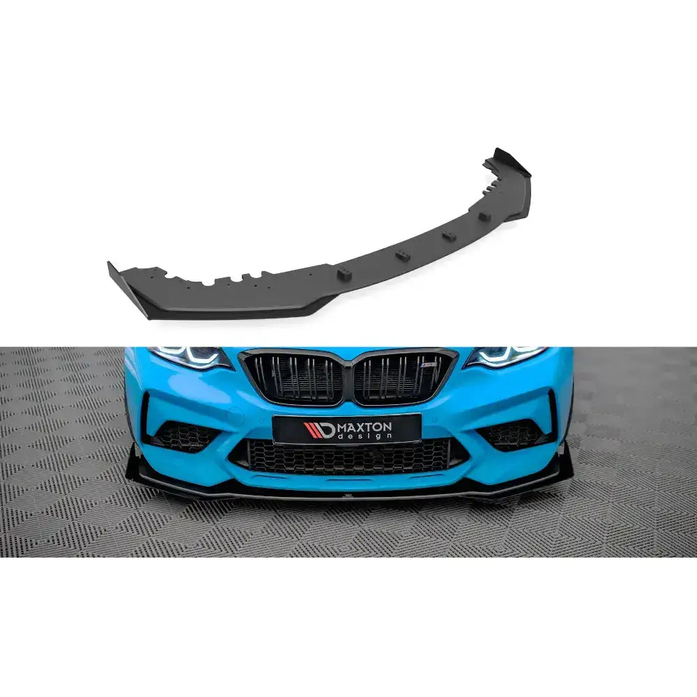 Frontleppe Street Pro V.1 med flaps til BMW M2 Competition F87, montert på blå bil, matt sort plast.