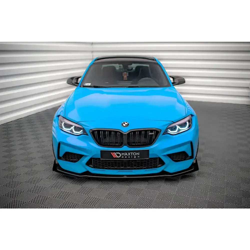 Frontspoiler Street Pro V.1 med flaps på Bmw M2 Competition F87, sett forfra med sorte detaljer.