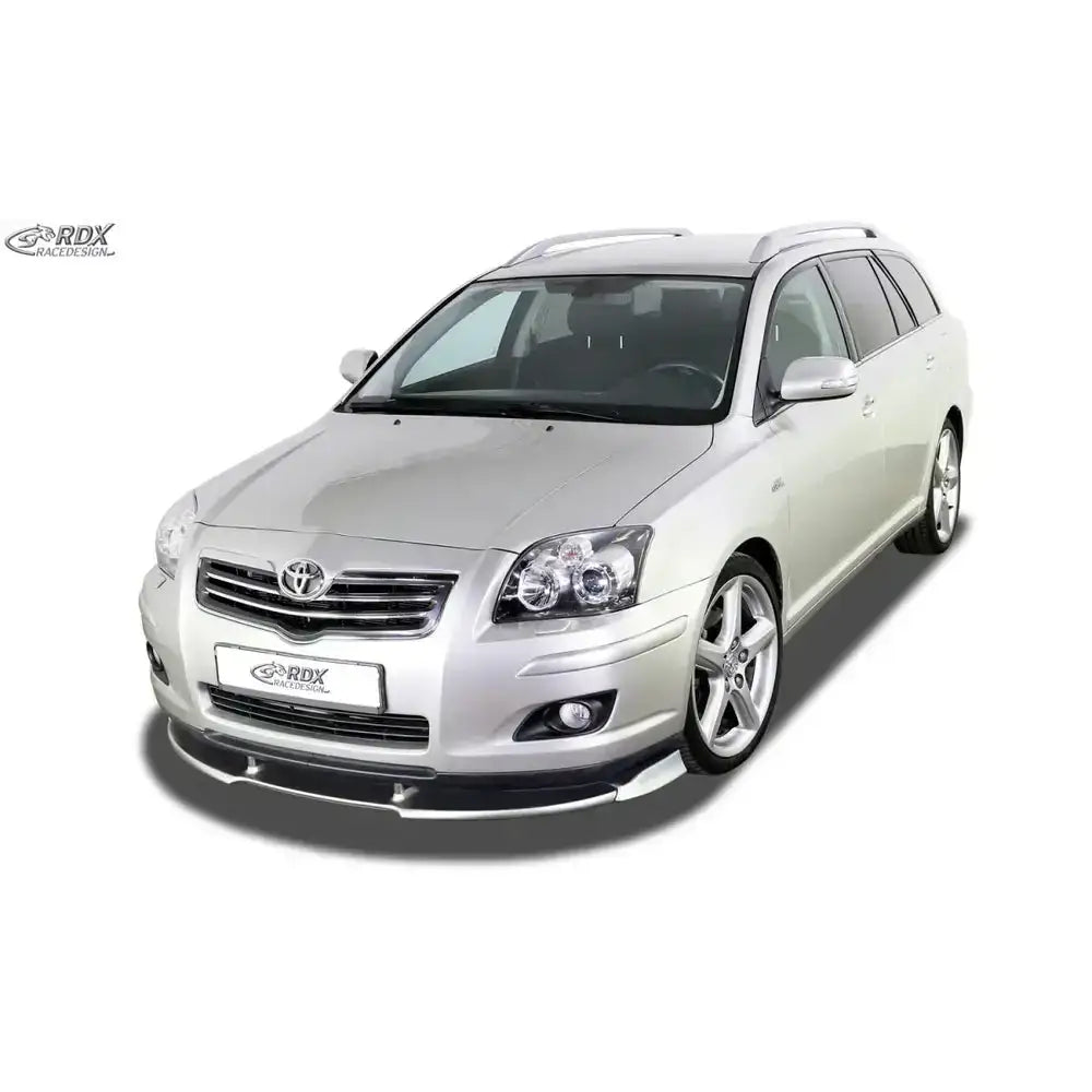 Frontspoiler på Toyota Avensis T25 06-09, sort og sølv, montert på sølvfarget stasjonsvogn.