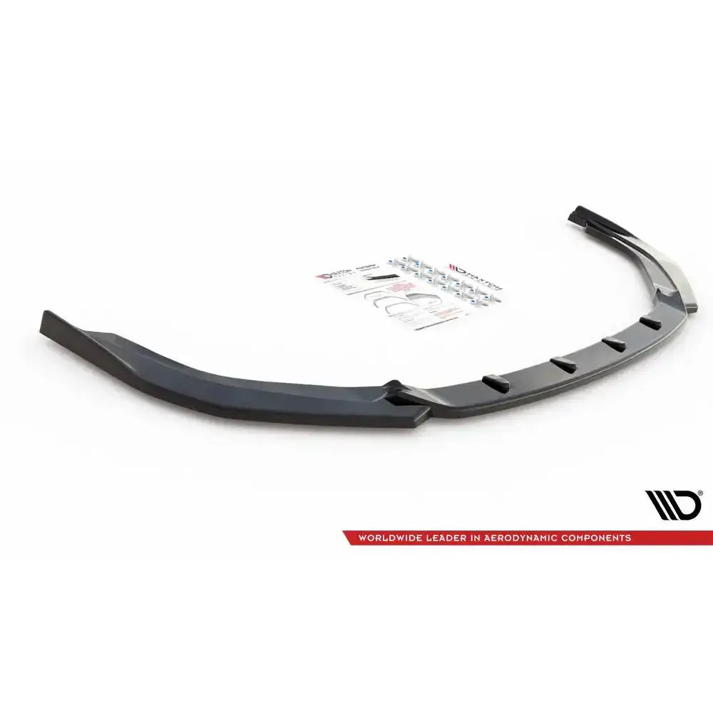 Front lip til Toyota Corolla GR Sport Hatchback, sett skrått ovenfra med monteringsutstyr og instruksjoner.