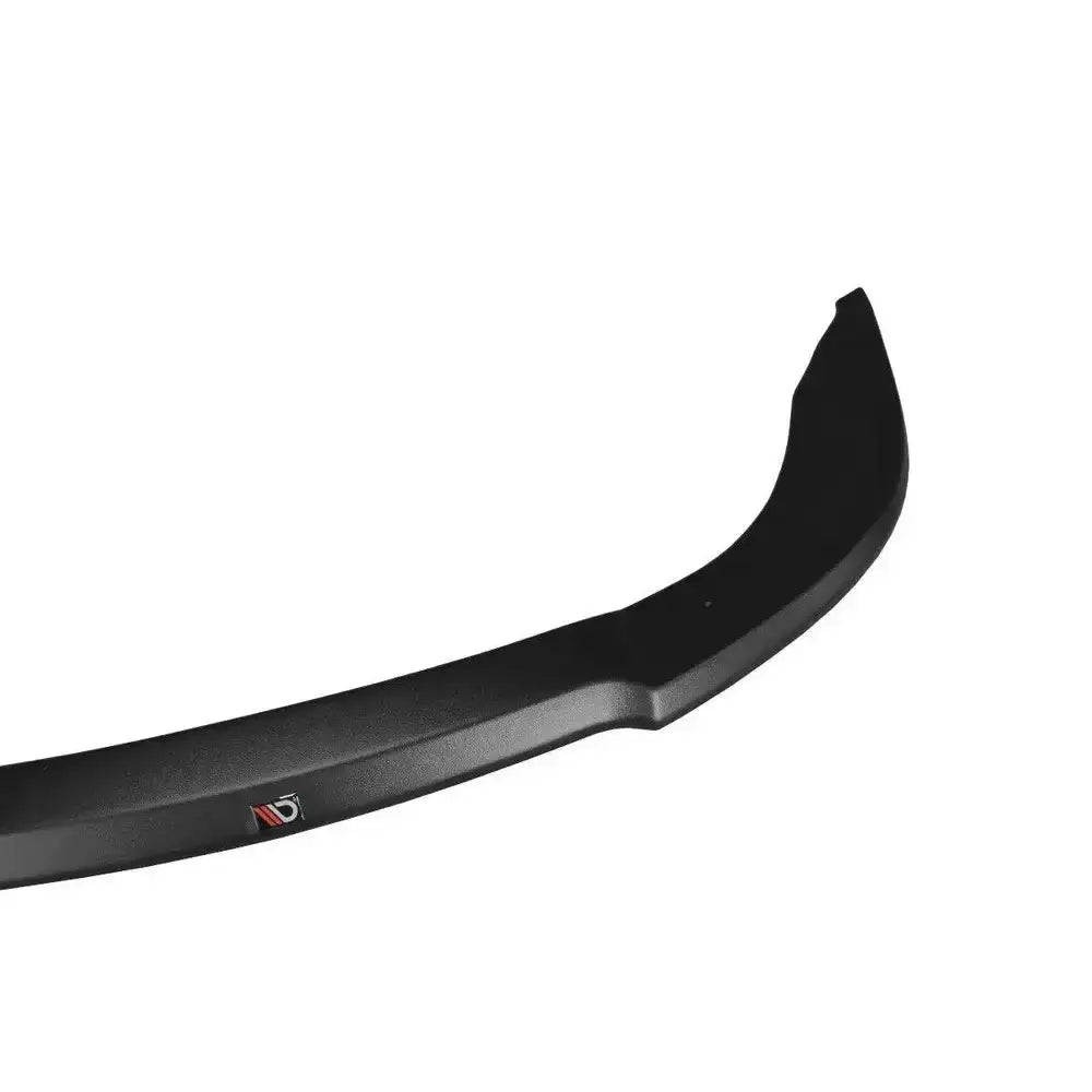 Frontspoiler for Audi A4 S-Line B6 i sort matt plast, nærbilde med synlig logo på venstre side.