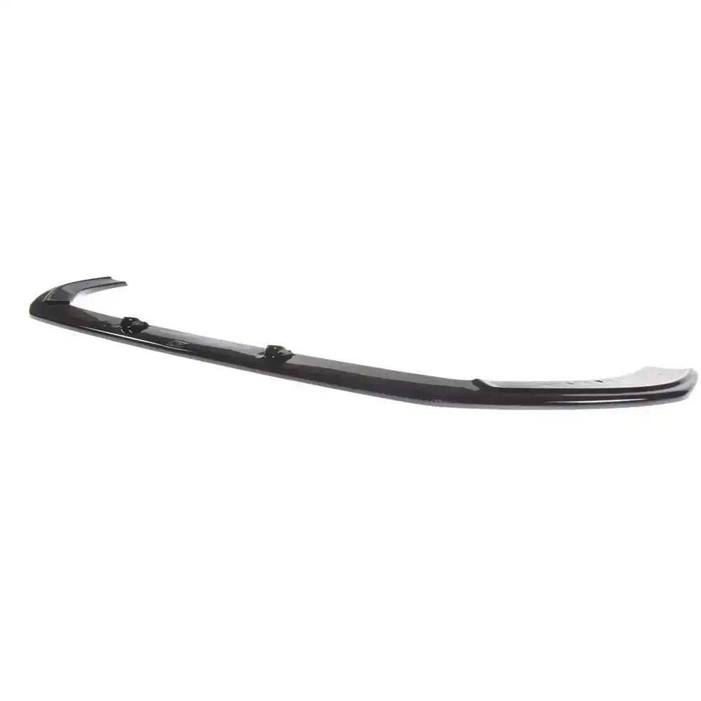 Frontspoiler Audi RS3 8V FL Sportback i sort plast, blank finish, sett fra skrå side med monteringspunkter.