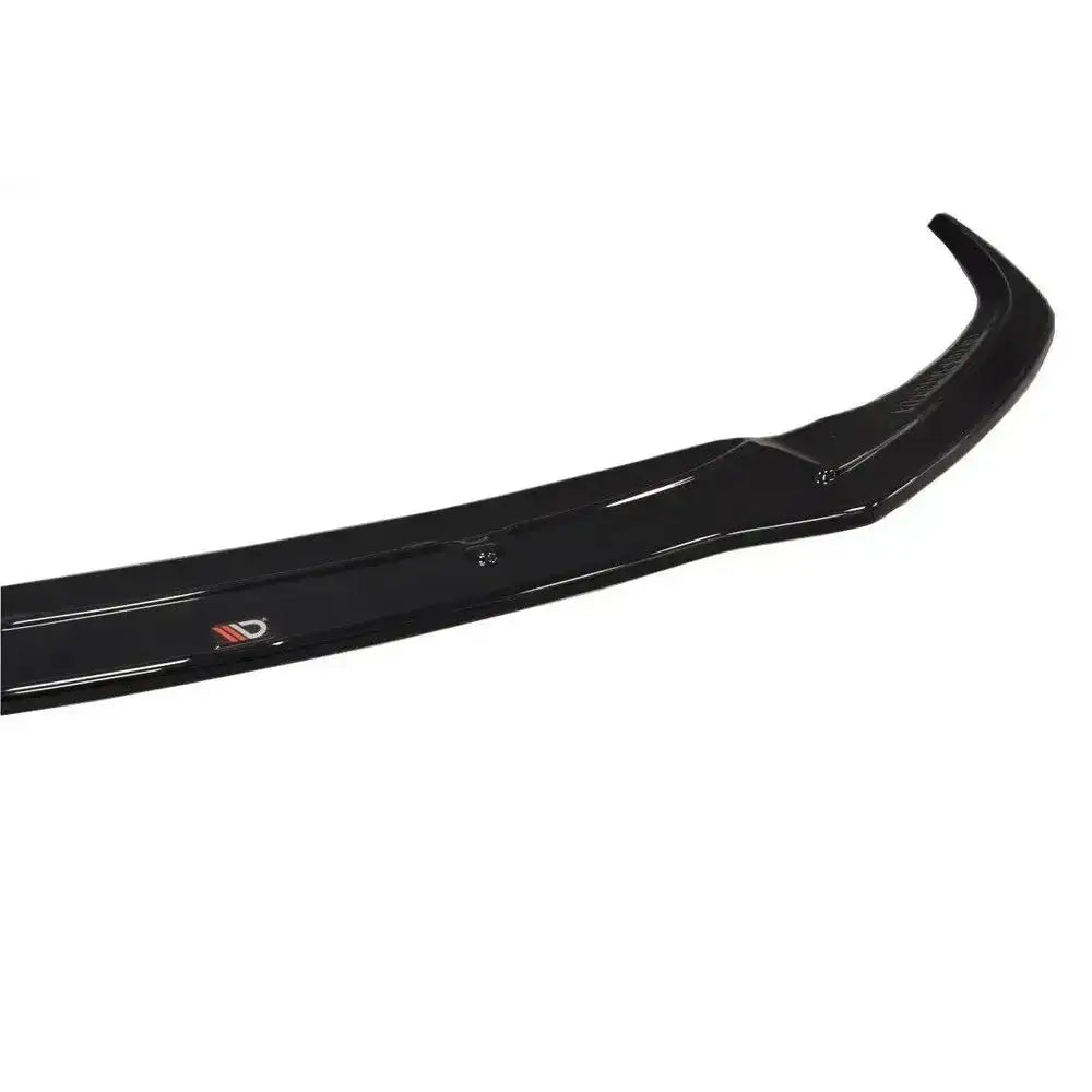 Frontsplitter til Audi RS7 Facelift V.1, sort plast med skinnende overflate og synlig logo venstre side.