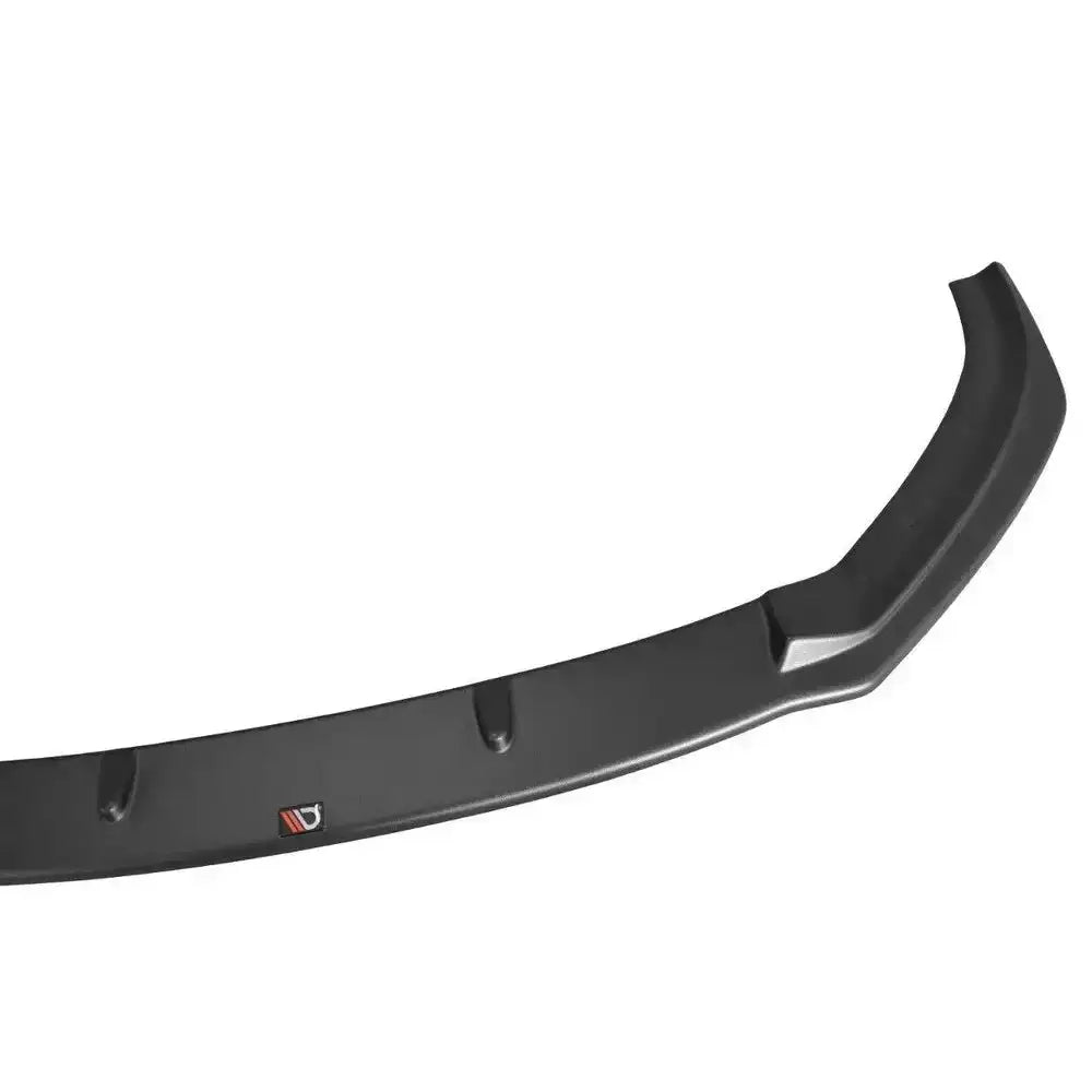 Frontspoiler til Audi S3 / A3 S-Line 8V FL i sort plast sett, sett skrått ovenfra med logo på venstre side.