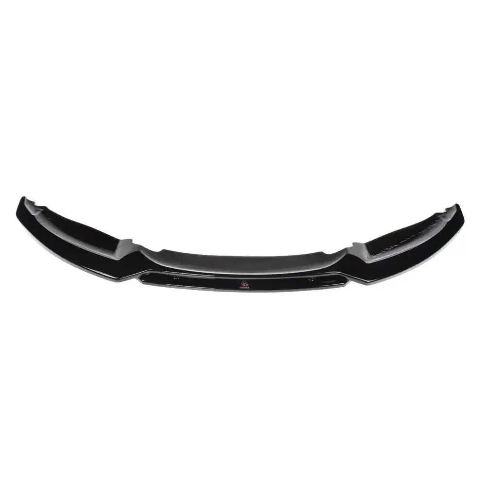 Front splitter for Bmw 1 E82 Facelift M-Pack, svart plast med markerte kanter, sett forfra.