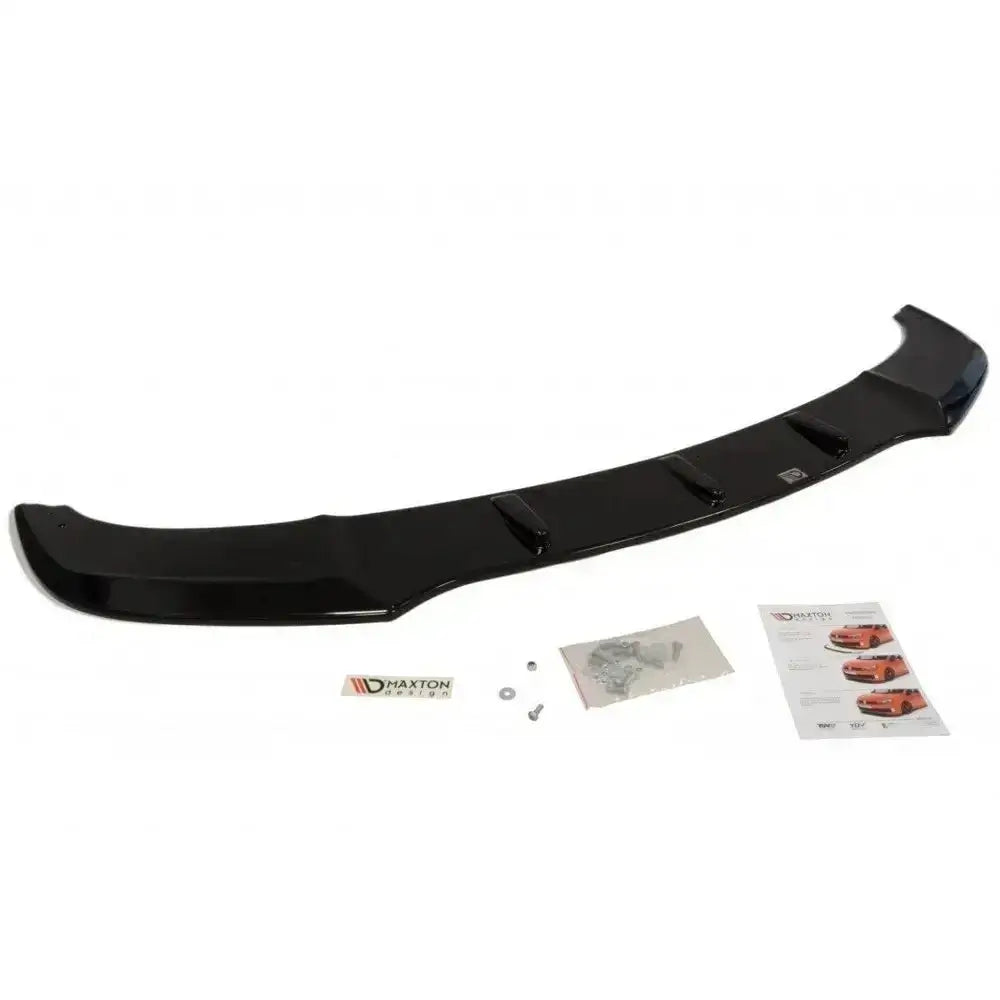 Front lip til BMW 5 F10/F11 Mpack, sort buet plast med finner, monteringsutstyr og bruksanvisning.
