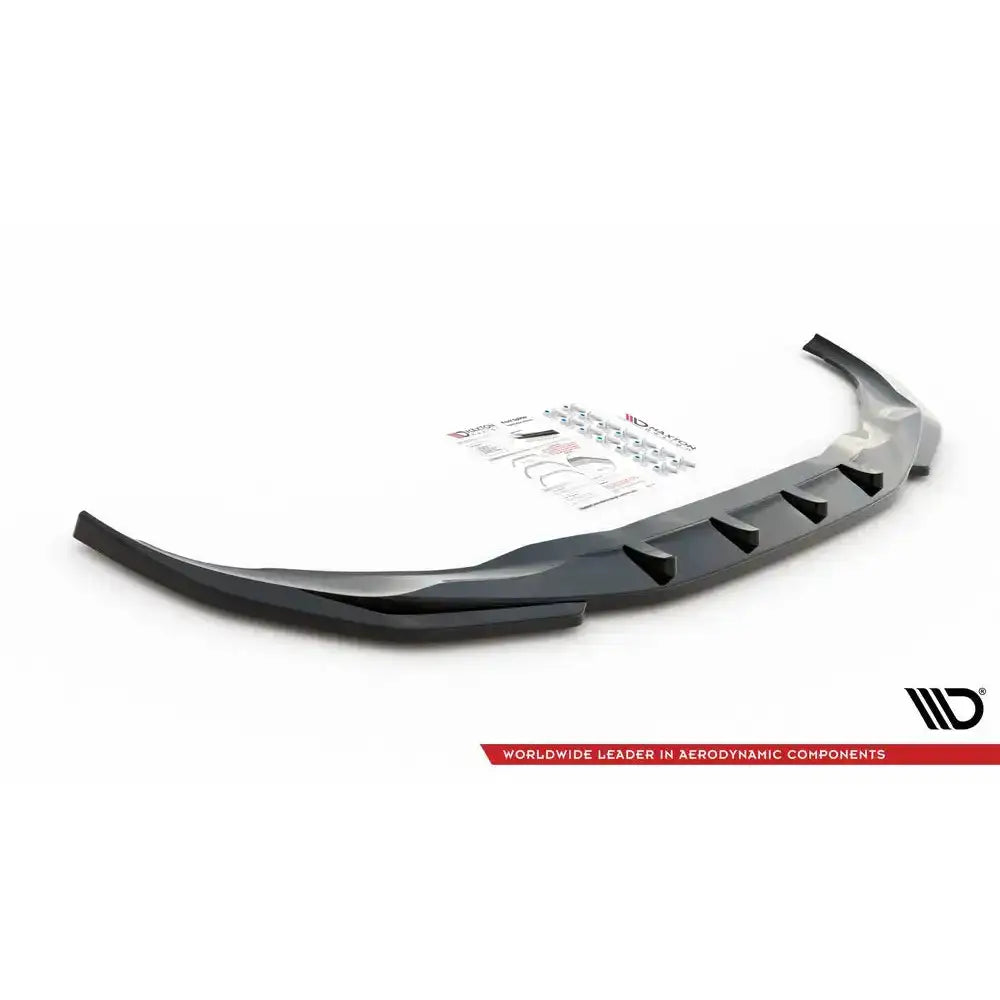 Front lip til BMW 7 G11 M-Pack Facelift V.1, svart plast med monteringsutstyr og instruksjoner.