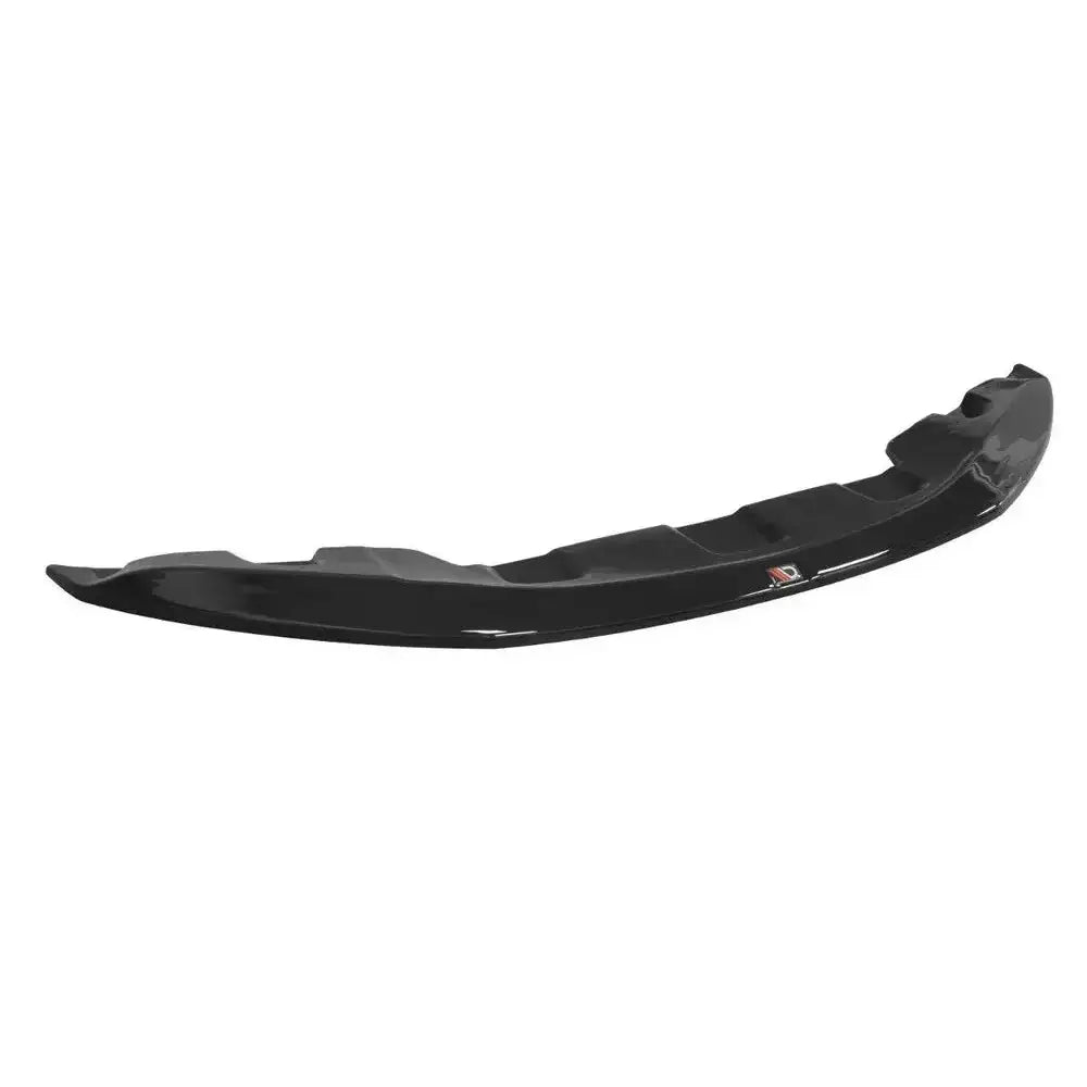 Frontleppe til Bmw M6 E63 V.1 i sort, glanset plast sett ovenfra mot hvit bakgrunn.