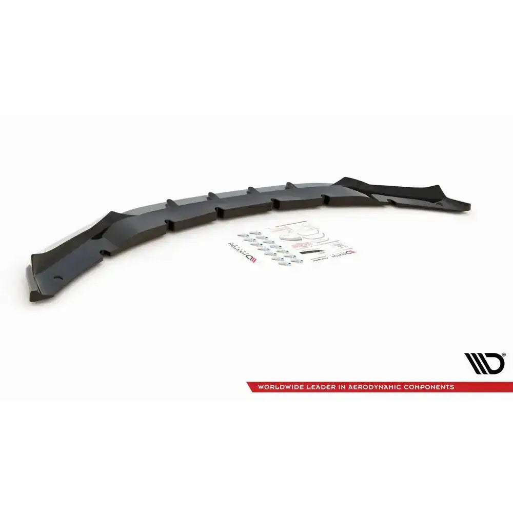 Frontsplitter til BMW X5 M F15 V.1 i sort plast med ribber, sett skrått ovenfra med monteringsutstyr.