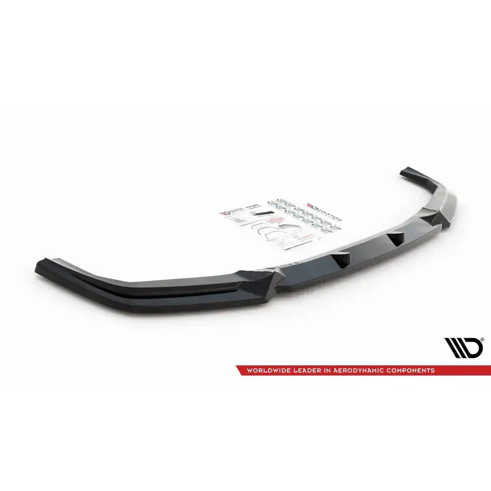 Front splitter til Bmw X5M F95 V.1 sett ovenfra med monteringsutstyr og instruksjoner på hvit bakgrunn.