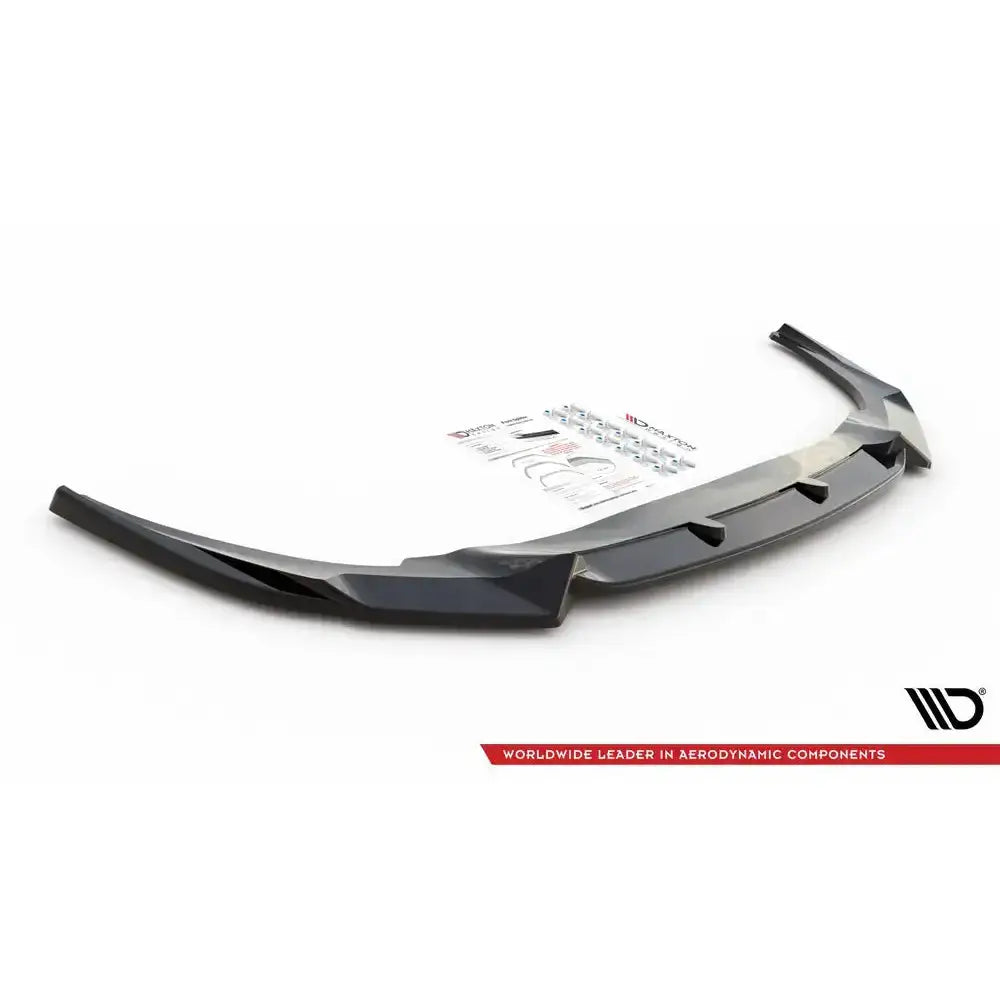 Front lip til BMW Z4 G29 M-Pack 2018-, sort plast med monteringsutstyr og instruksjoner synlig.
