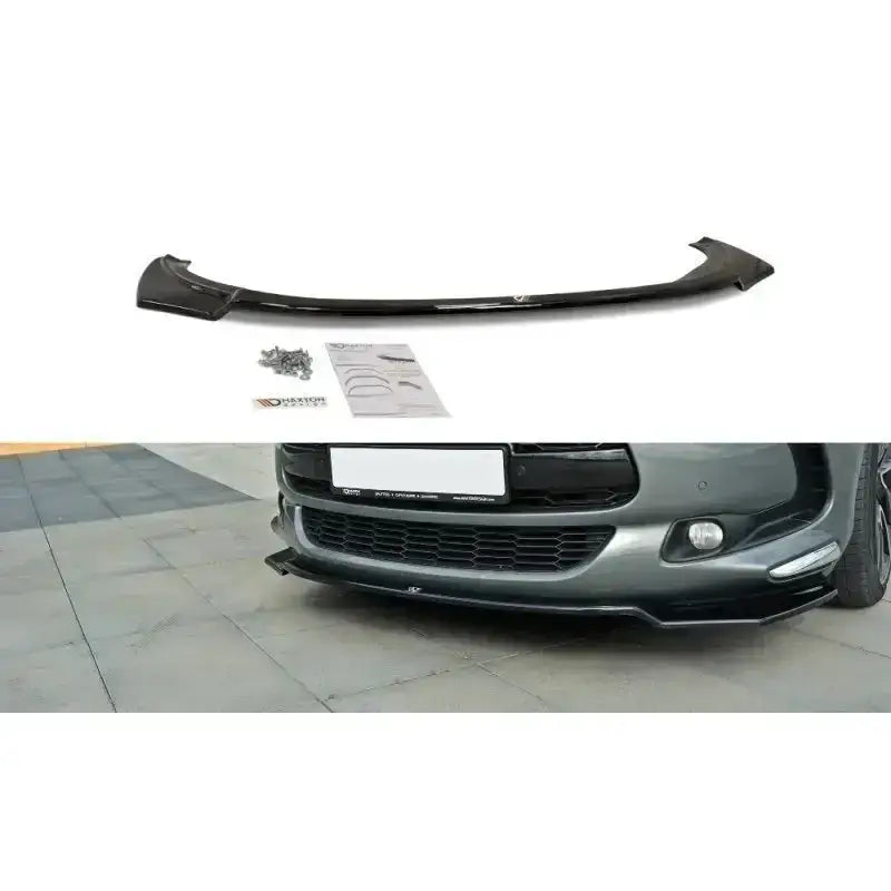 Frontleppe V.1 Citroen Ds5 Facelift i sort blank plast sett ovenfra med skruer og monteringsinstruksjoner.